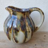 Ceramic pitcher in the shape of a coloquinte melo.