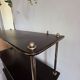 Wooden shelf with gold metal
