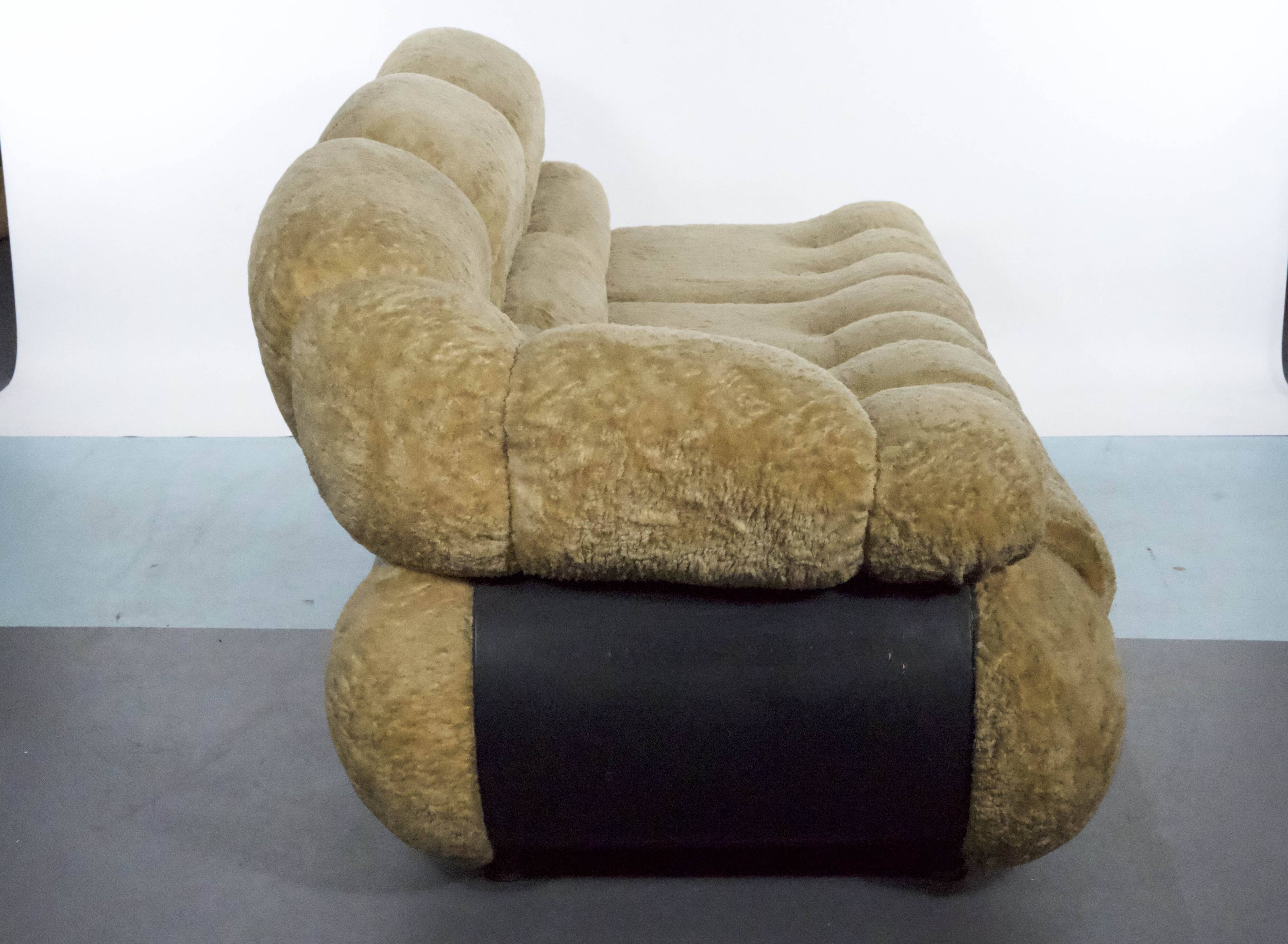three-seater sofa designed by Adriano Piazzesi, produced in Italy during the 1970s. Upholster
