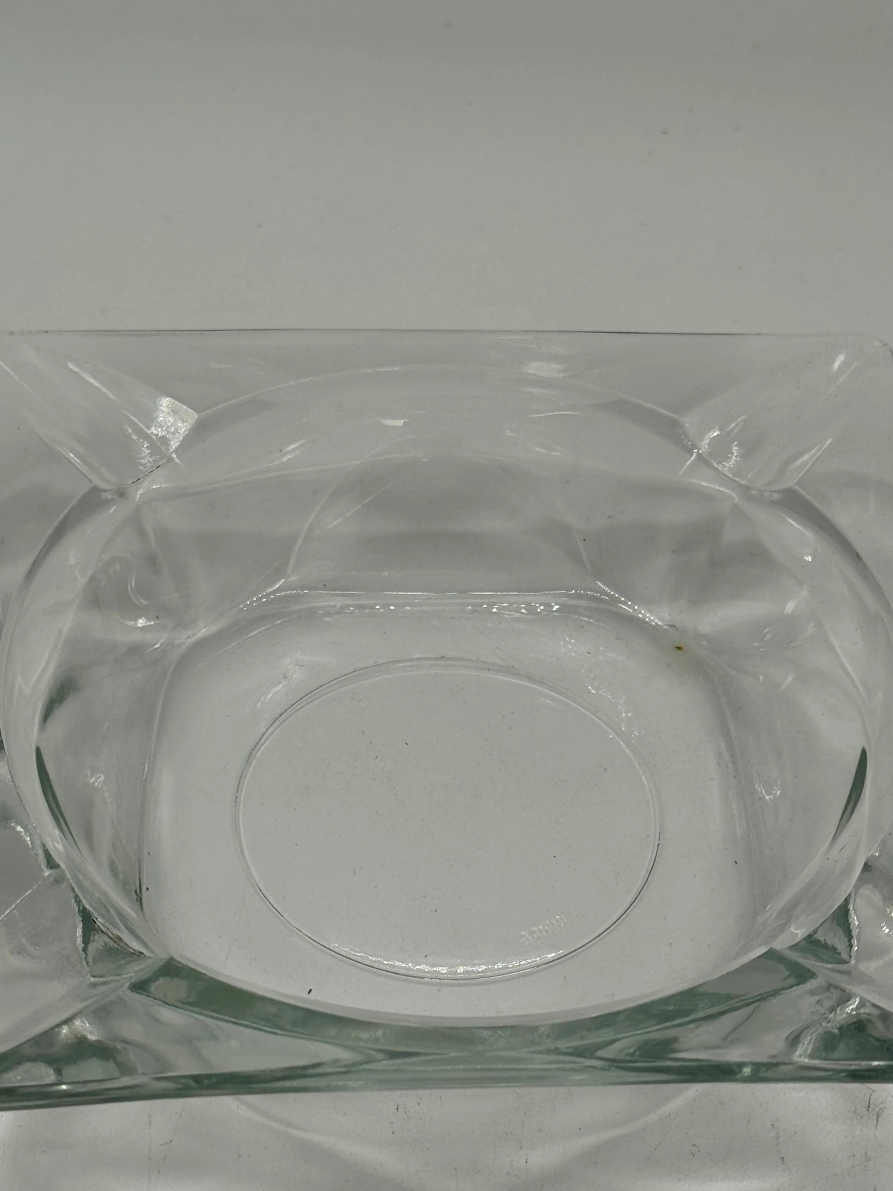 Vintage square glass ashtray, minimalist design.