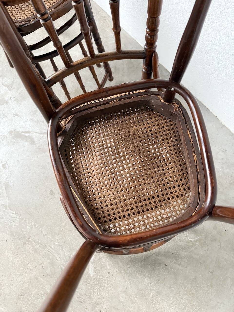 Set of 4 Fischel cane bistro chairs