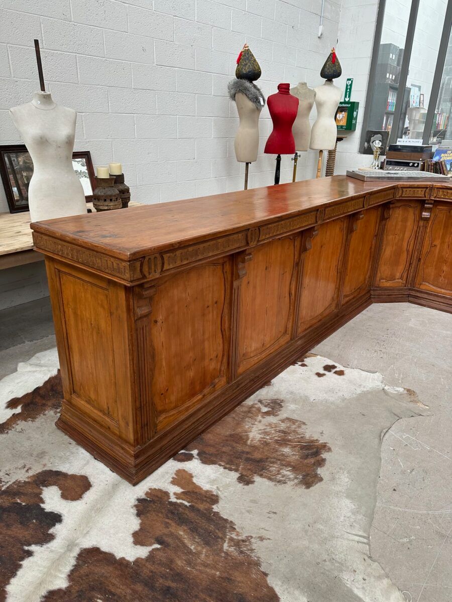 Large corner bar counter from the late 19th century.