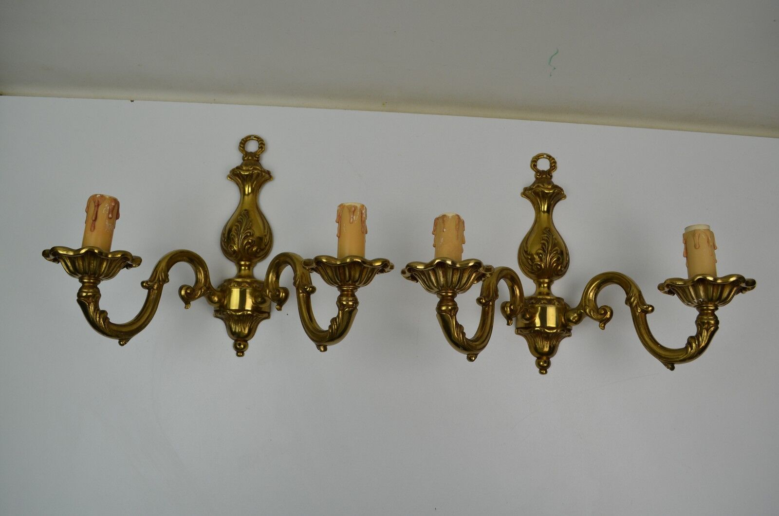 Pair of wall lamps with two lights in Louis XV style bronze