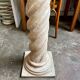 Beige carved wooden column