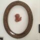 Oval frame in wood and gilded stucco