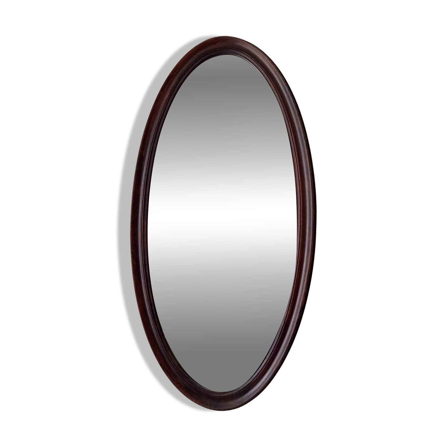 Oval antique mirror in solid wood from the 1960s.