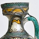 Berrada decorative pitcher made of pewter.