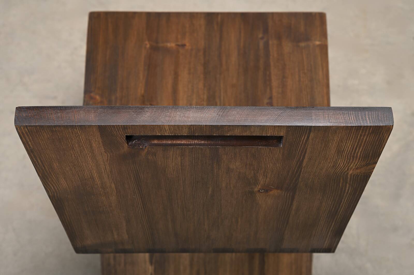 Gerrit Rietveld Zig Zag Chair is dark brown stained wood