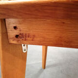 Dining table with compass feet