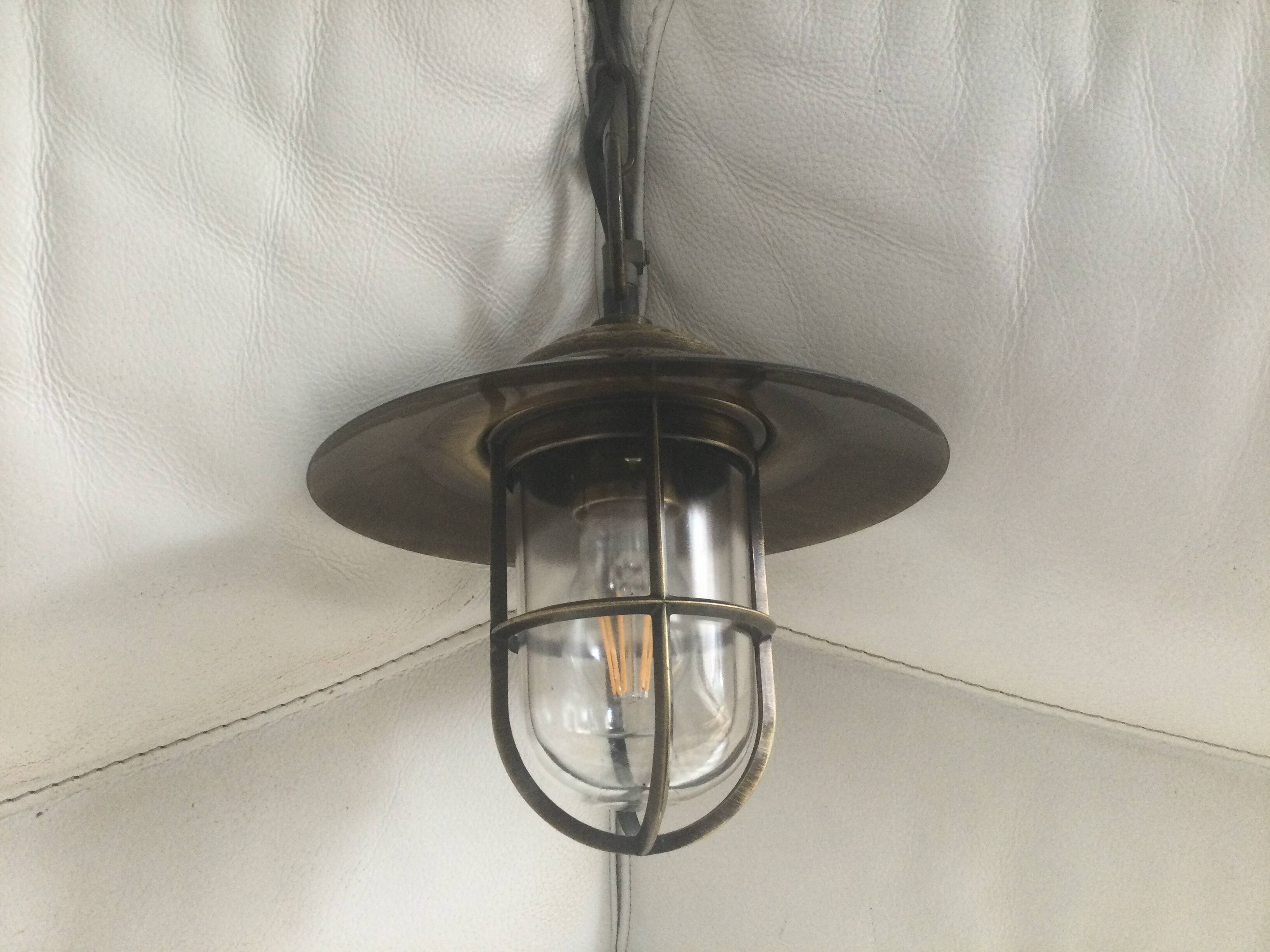 Patinated brass light fixture