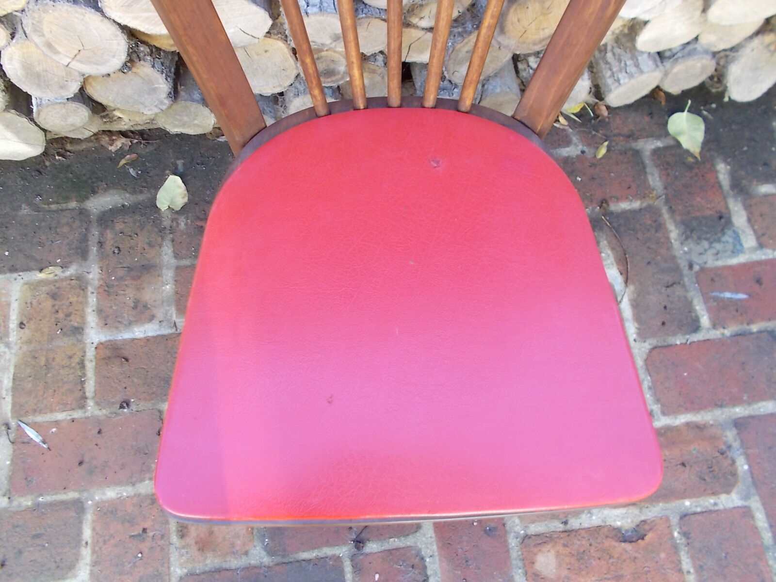 Vintage bistro chair sitting red