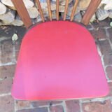 Vintage bistro chair sitting red