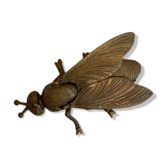 Gold metal ashtray fly