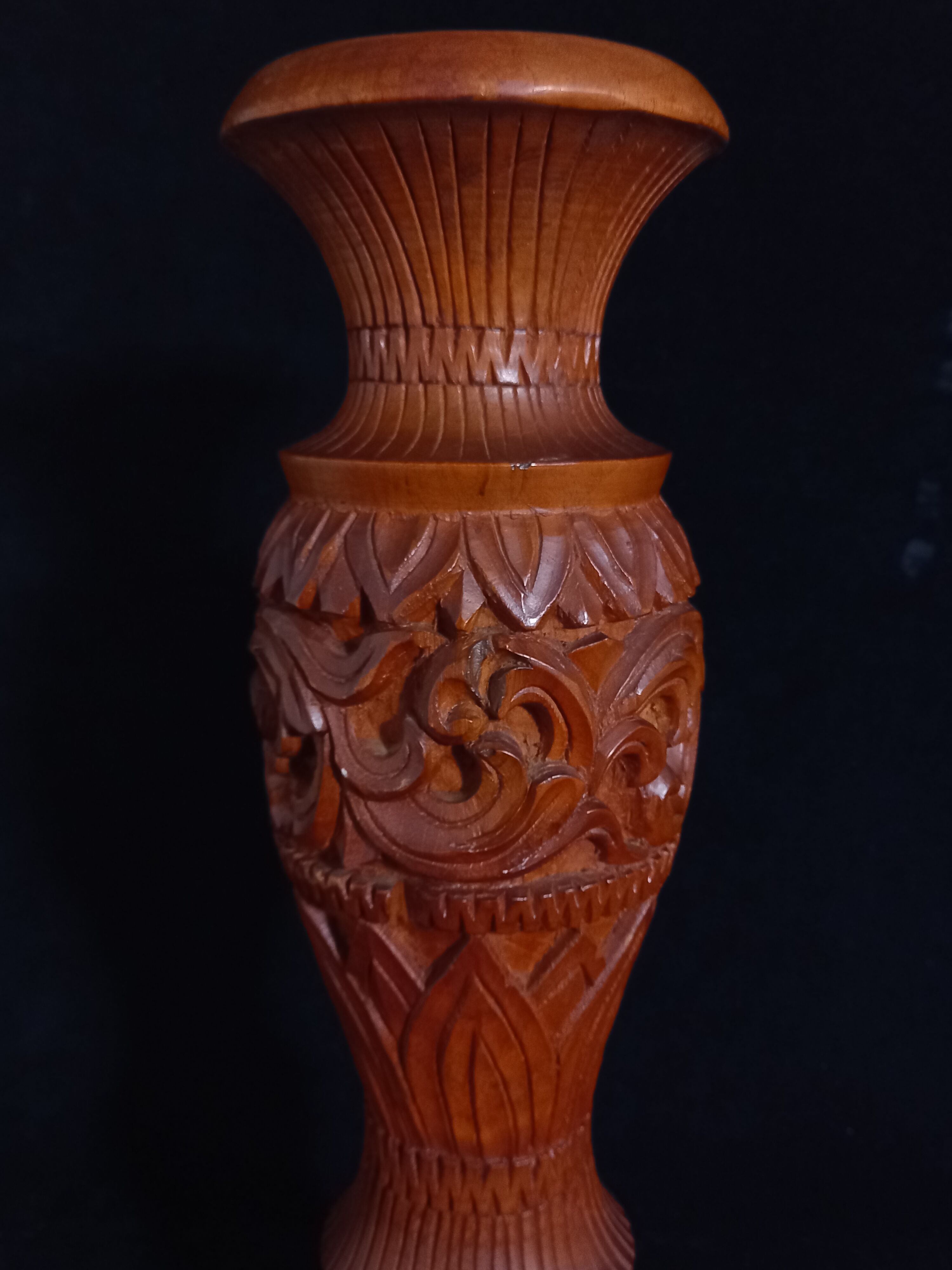 Exotic vase in carved wood