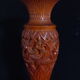 Exotic vase in carved wood