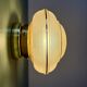 Vintage Art Deco globe wall/ceiling light in frosted yellow and gold glass.