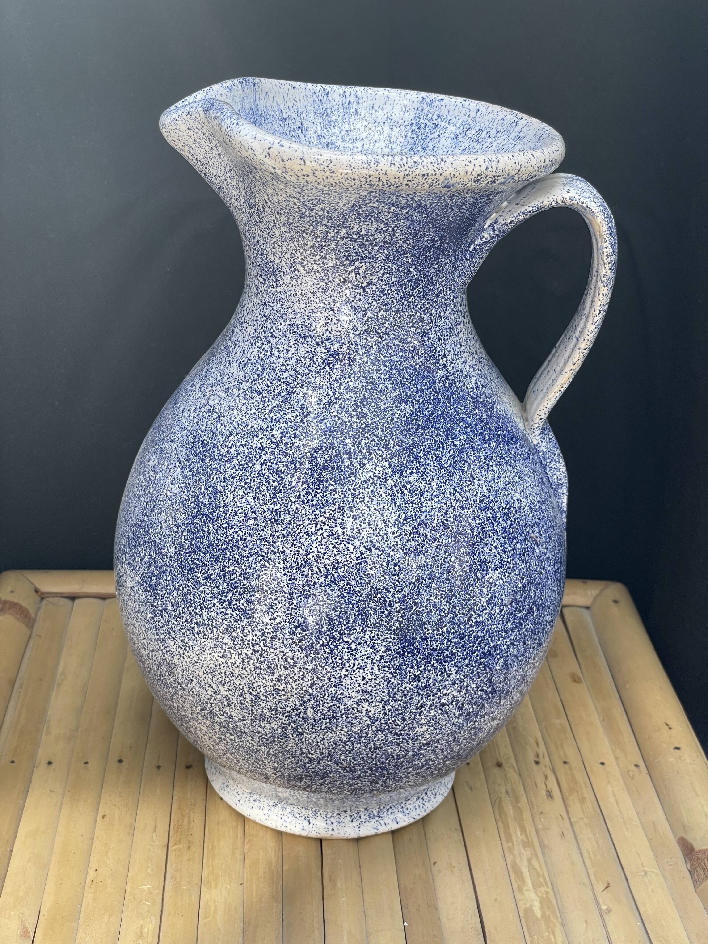 Pitcher in blue speckled terracotta signed made in Malaye numbered vintage.very good condition.