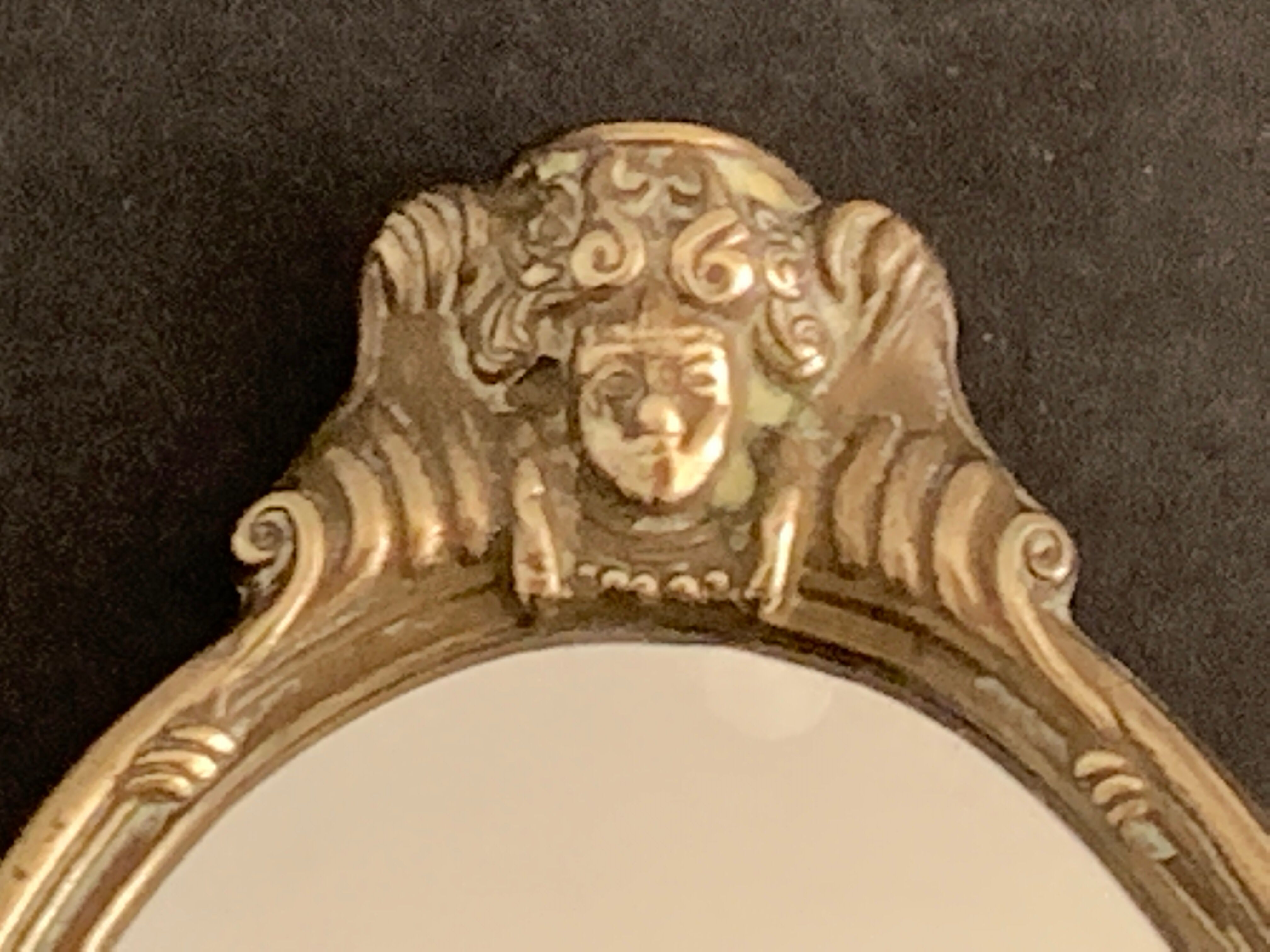 Bronze hand-facing mirror, early twentieth century, Louis XV style, 29 x 13 cm