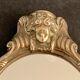 Bronze hand-facing mirror, early twentieth century, Louis XV style, 29 x 13 cm