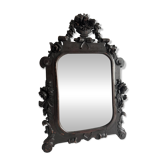 Napoleon III mirror in carved blackened wood, 19th century