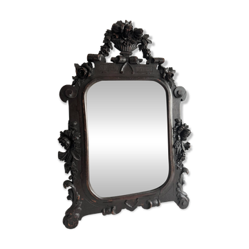 Miroir Napoléon III en bois noirci sculpté, XIXe siècle