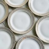 12 Limoges porcelain dessert plates, gold decoration.