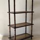 Vintage wooden shelf with cane, colonial style, 4 levels.