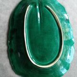 Large dish in green cabbage leaf slip