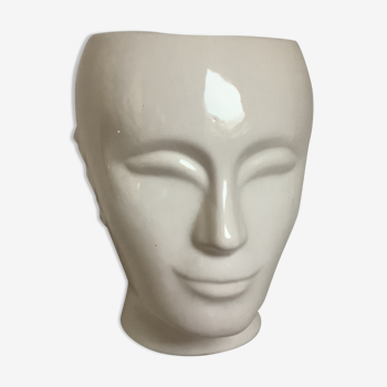 Man's head hide pot vase