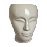 Man's head hide pot vase