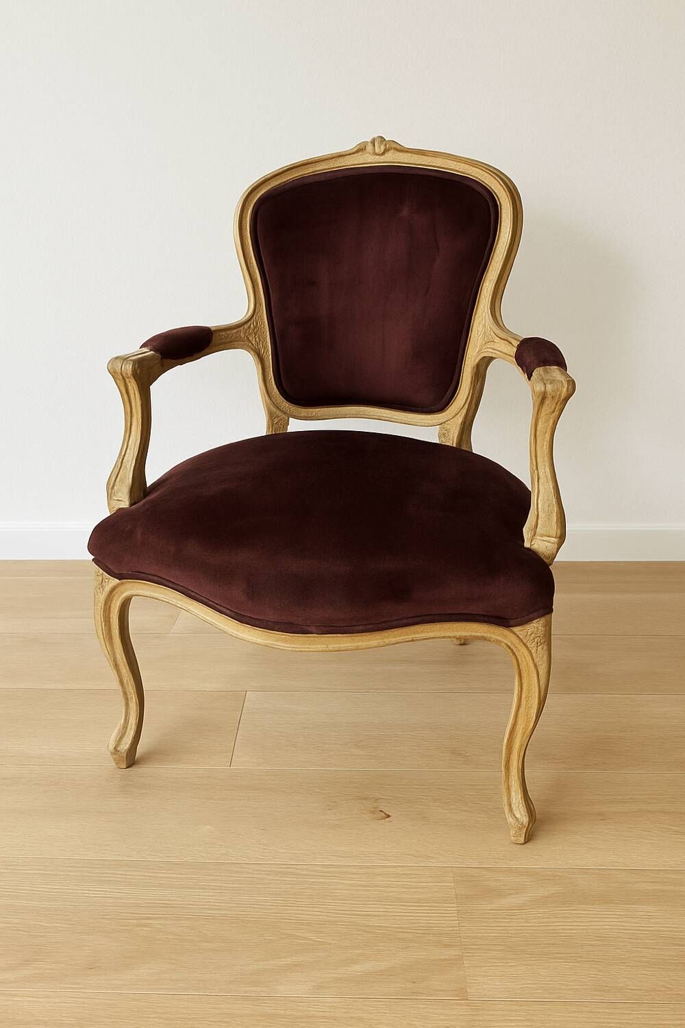 Louis XV style cabriolet armchair in burgundy velvet and carved wood