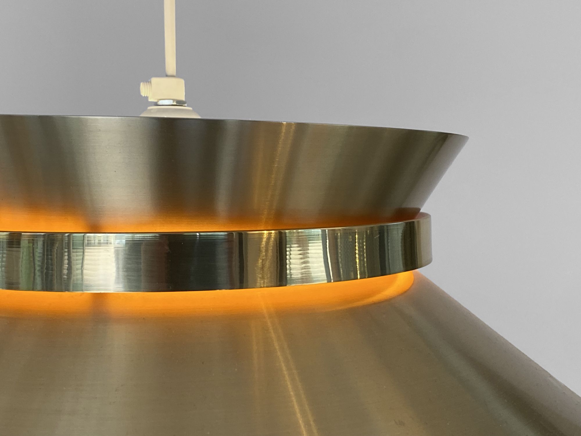 Brass colored aluminium pendant light by Carl Thore for Granhaga Metall. Sweden 1970s