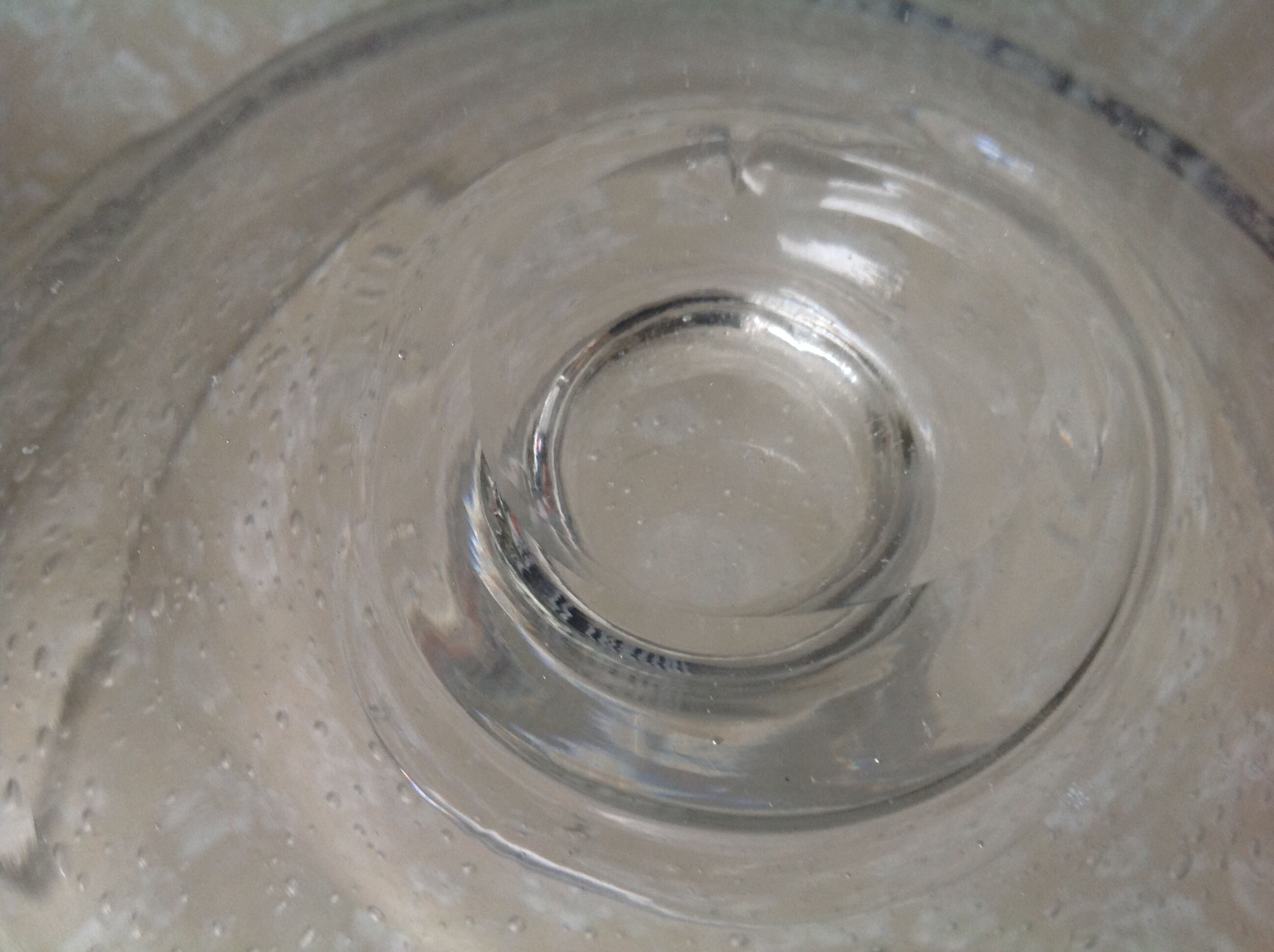 Biot cup in blown bubbled glass on foot