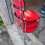 6 red and chrome Formica chairs