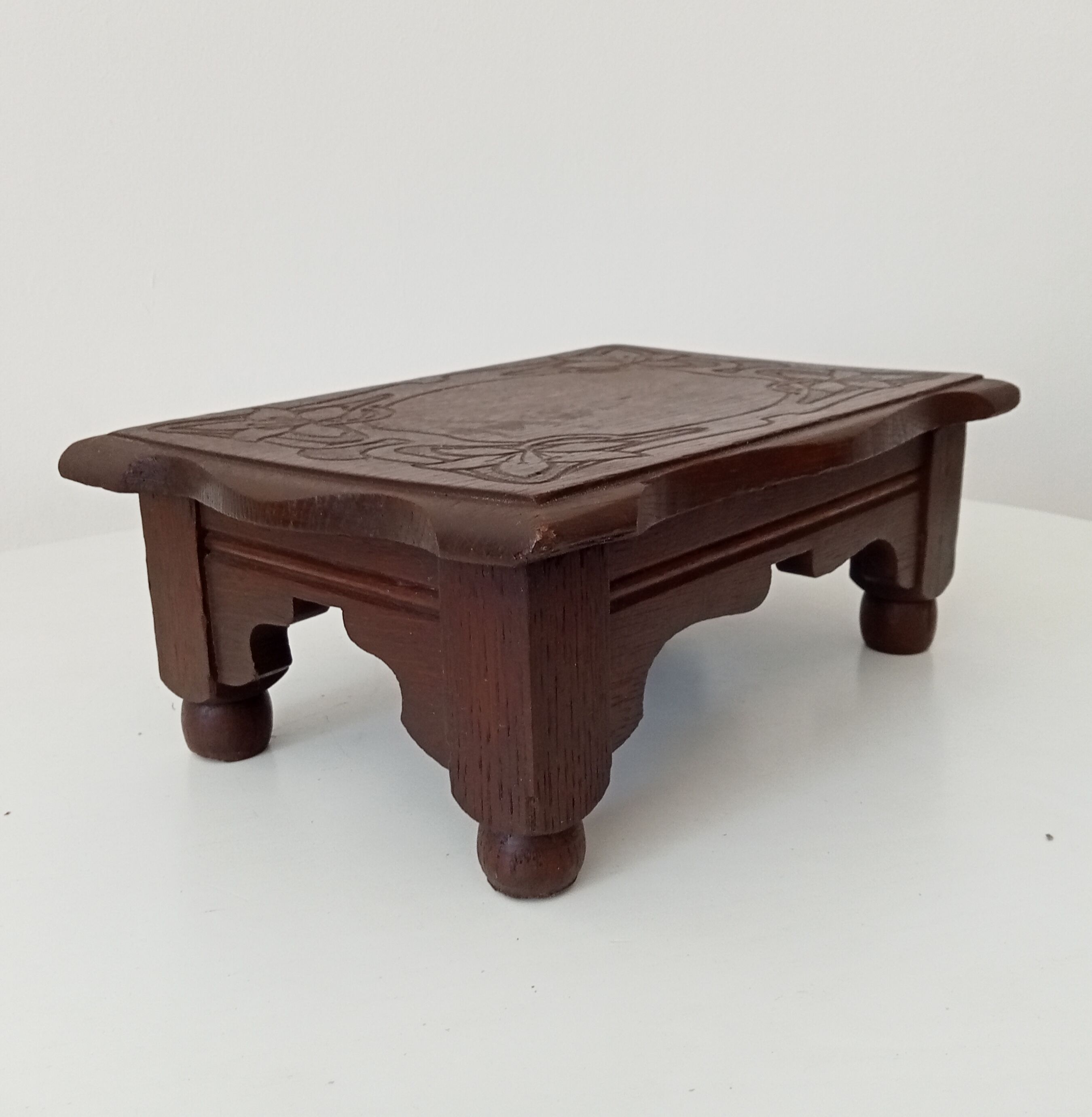 Antique carved wooden stool