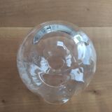 Glass ball vase with corolla
