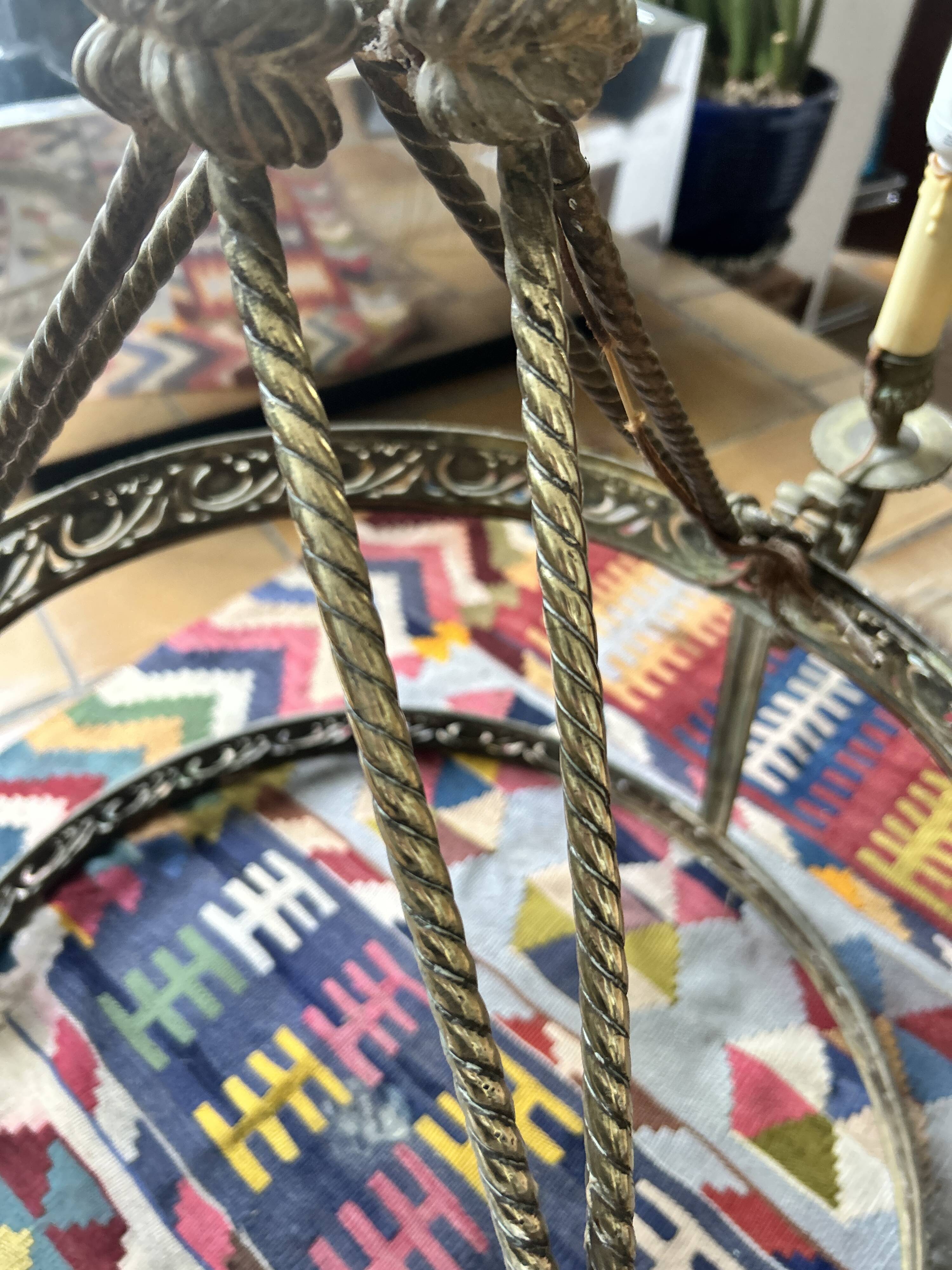 Brass chandelier from the early 20th century.