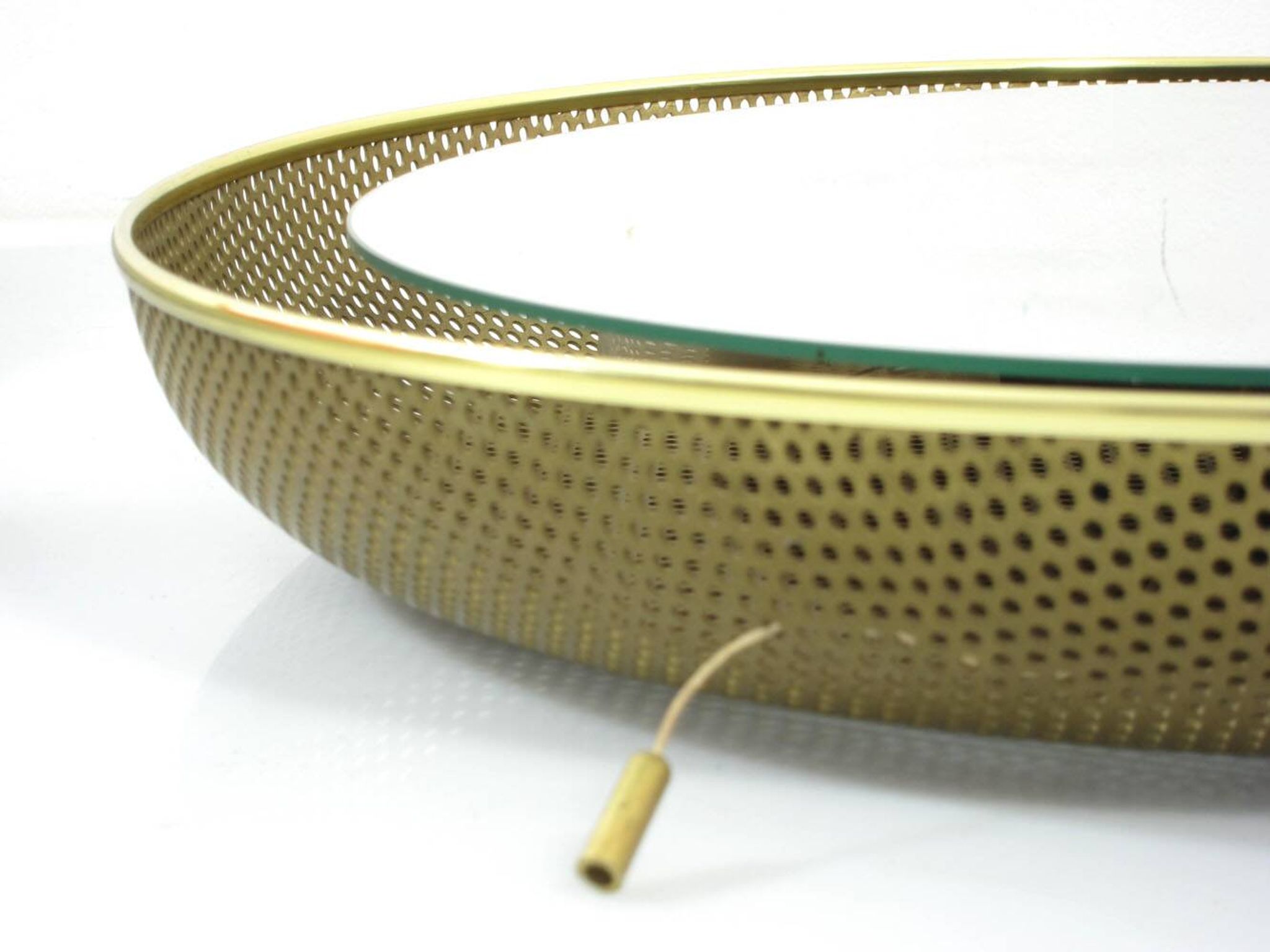 Vintage gold mirror by Mathieu Mategot for Artimeta from the 1950s with light.