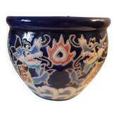 Decorative pot in multicoloured relief glazed ceramic.