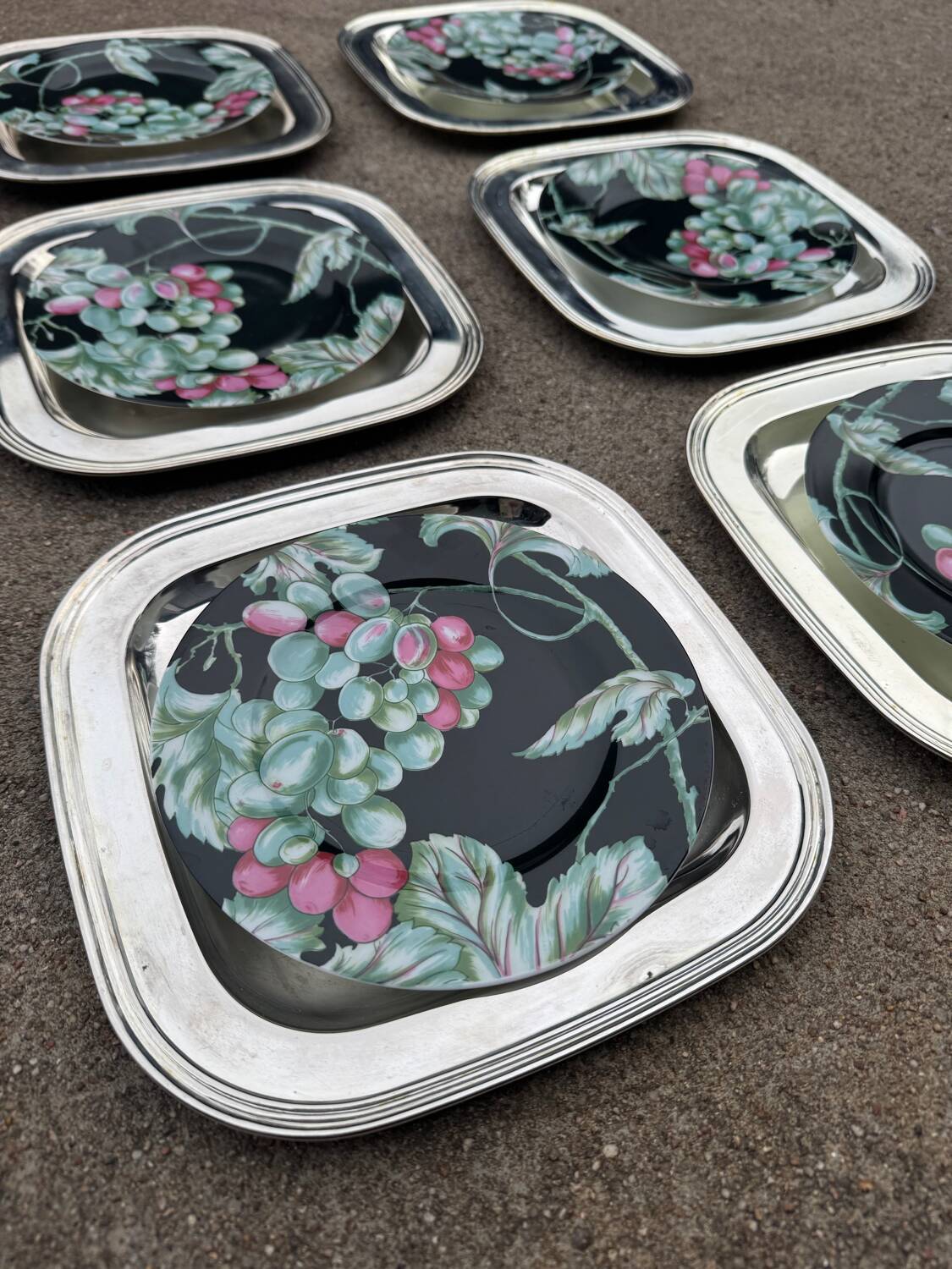 Silver-plated metal underplates from the 1980s.