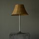 Grace table lamp in tin with rattan shade, 1930s