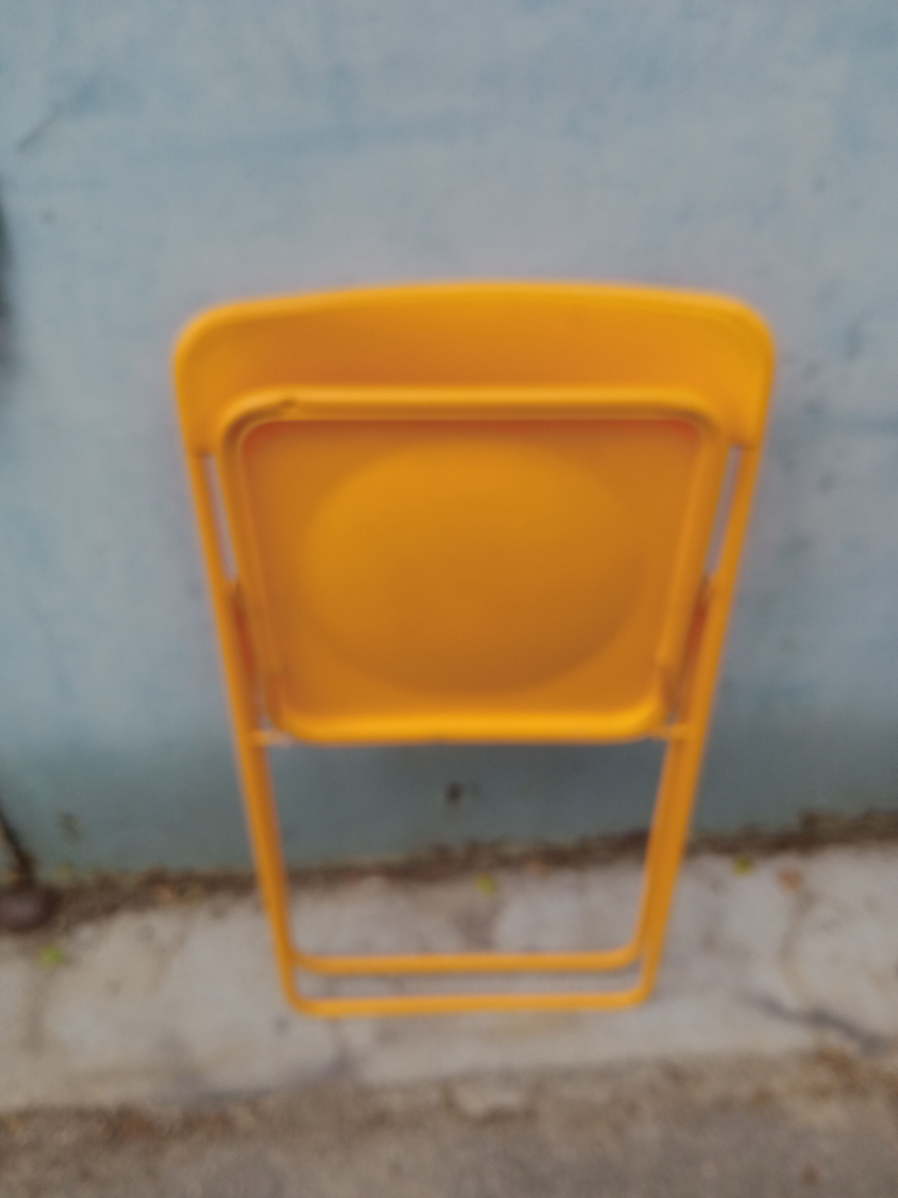 Orange vintage folding chairs