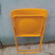 Orange vintage folding chairs