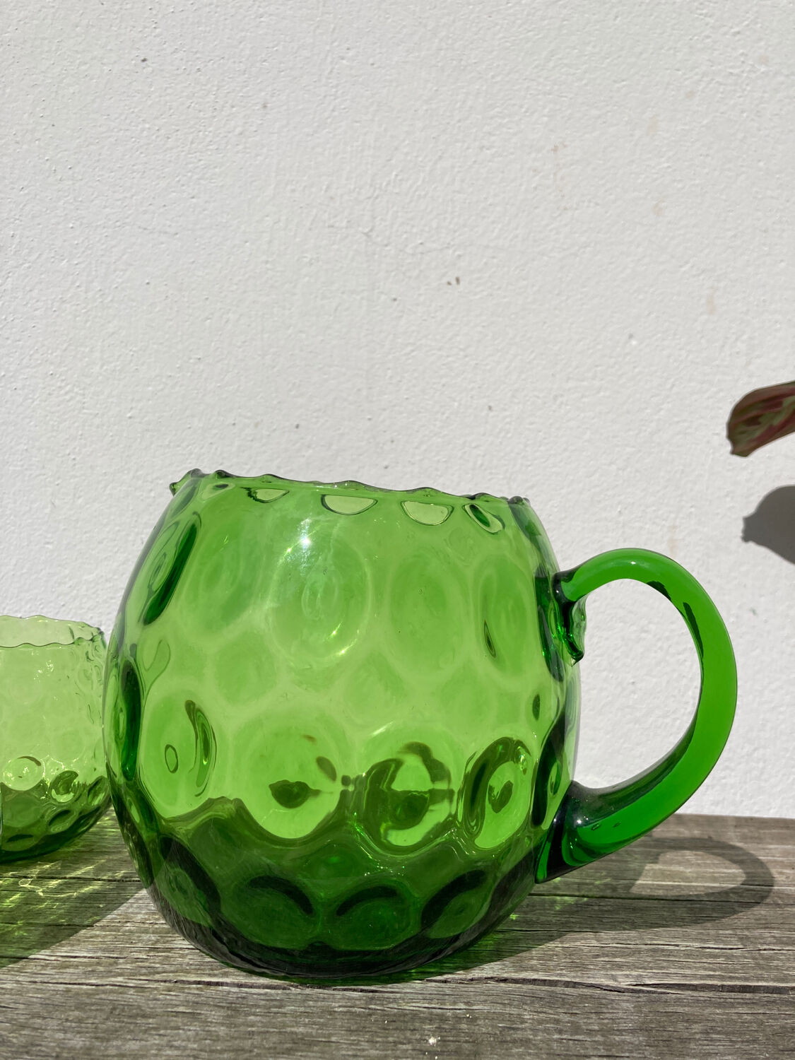 4 green water glasses and vintage blown glass carafe