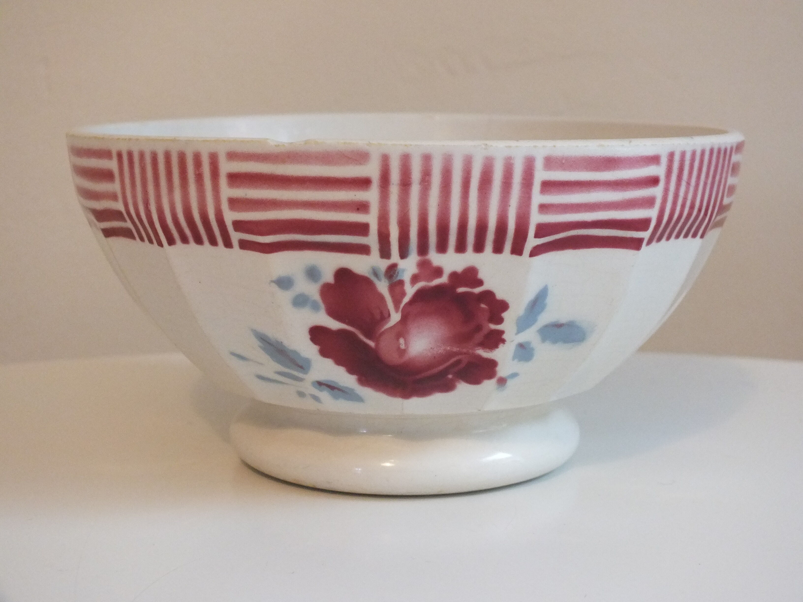 Vintage faceted bowl decorated with roses