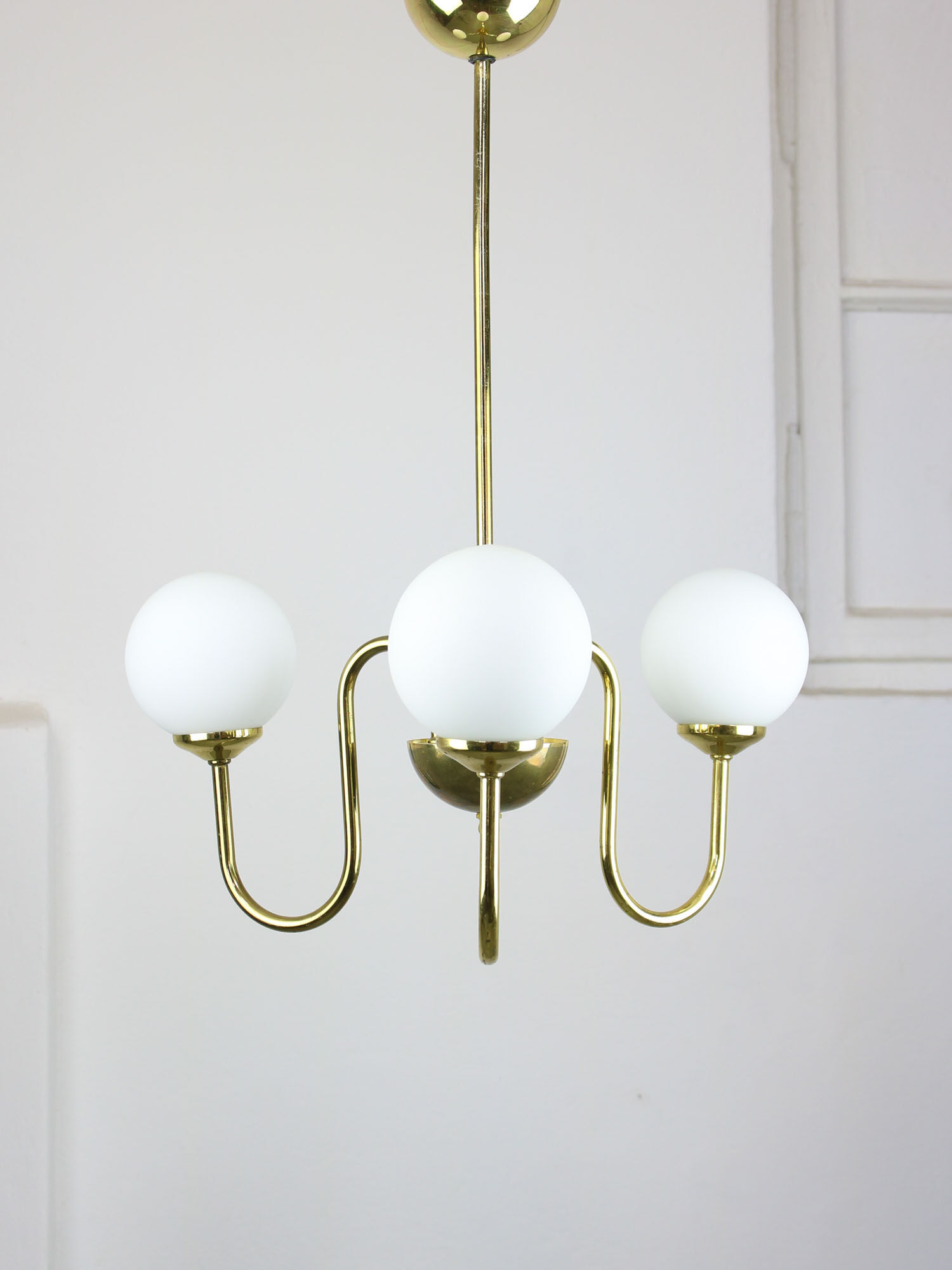 Vintage golden chandelier in opaline glass