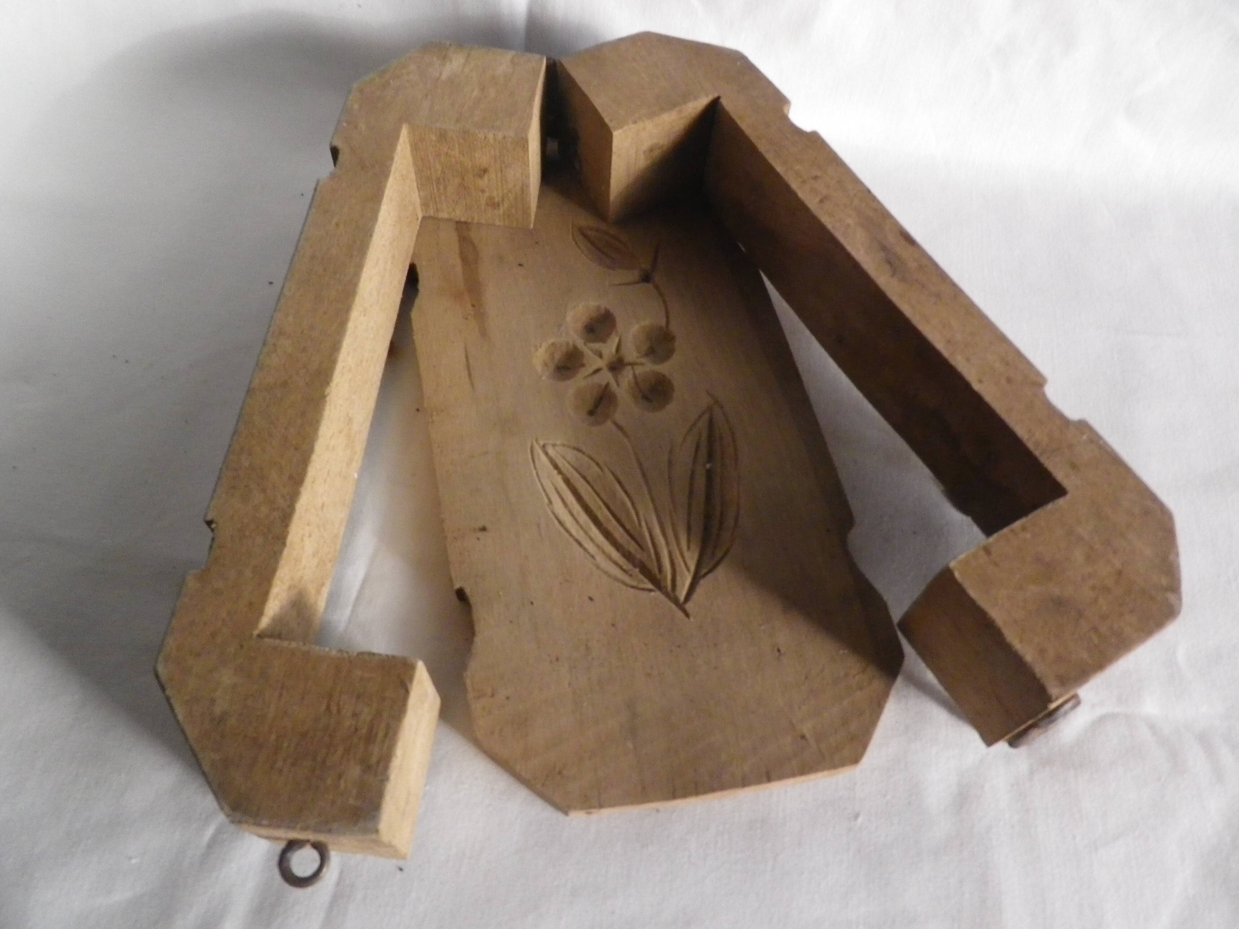 old wooden butter mold