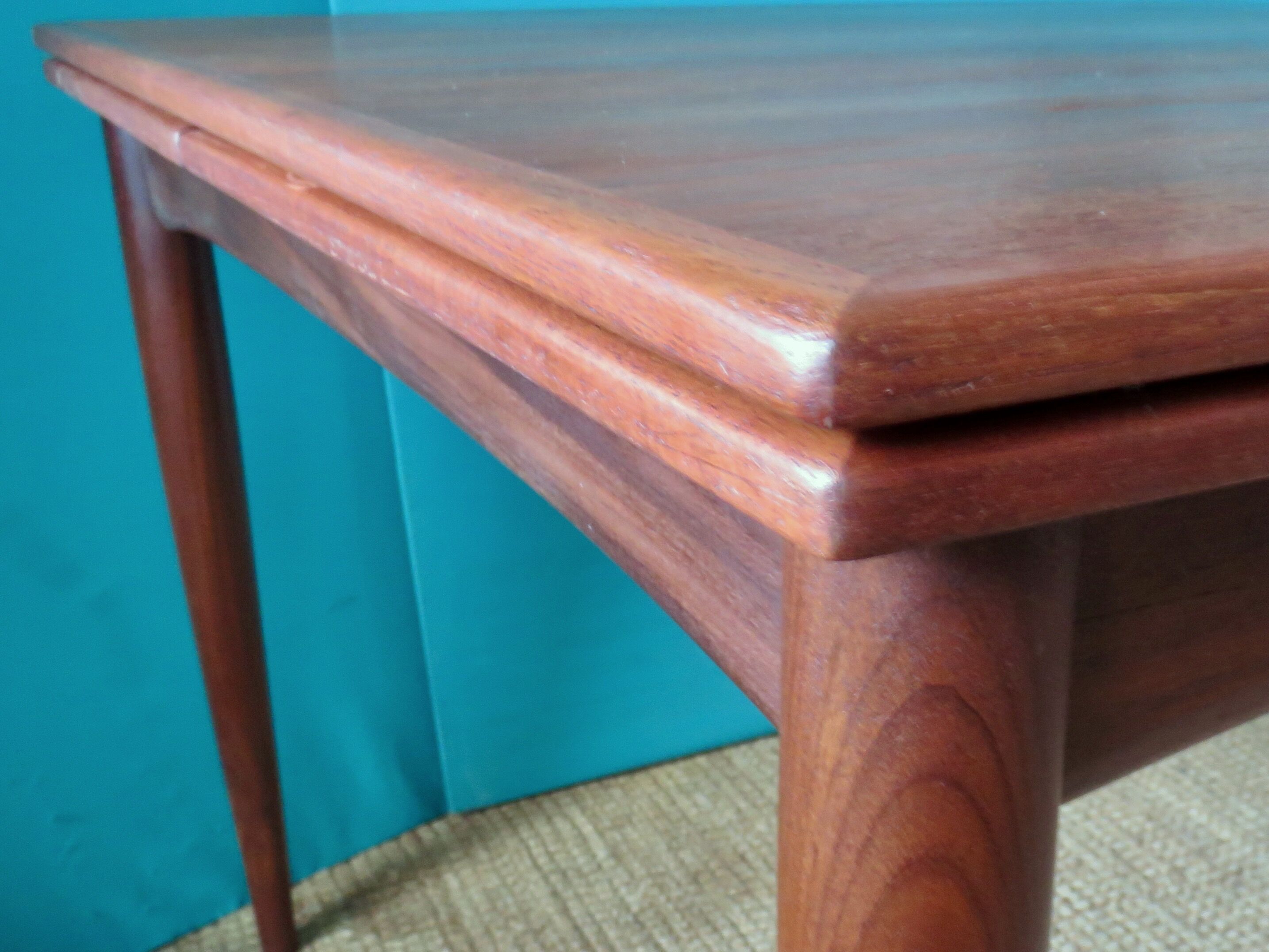 Square table in teak with extensions. Denmark 1960