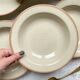 6 Deep plates in speckled beige stoneware, Tulowice style, Poland 1970