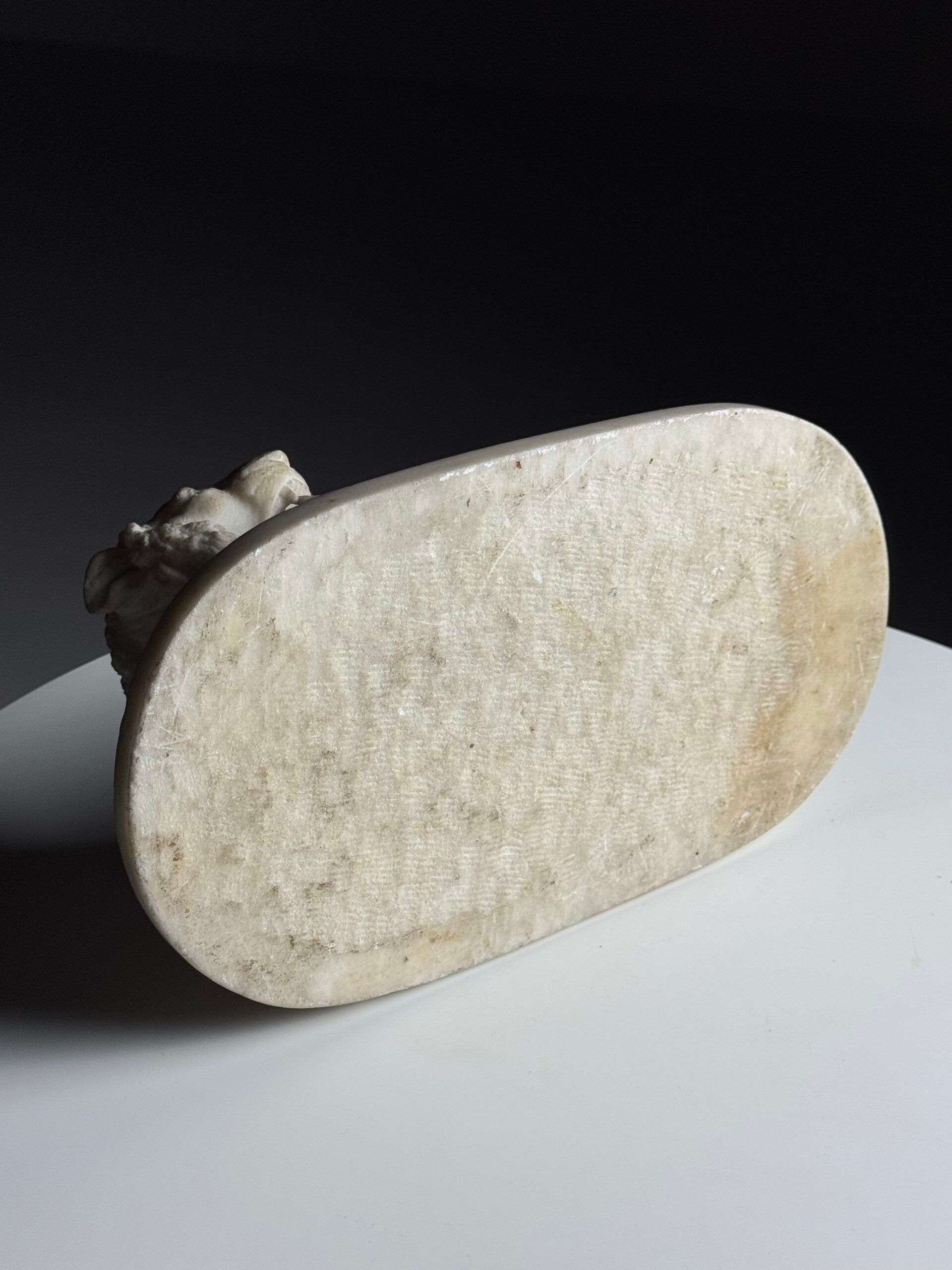 Marble sculpture of a reclining lion
